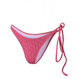 Photo détourée sur fond blanc du bas de maillot Bari rose fuschia avec de la ficelle sur le côté gauche