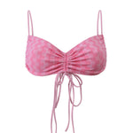 Photo détourée sur fond blanc du haut de maillot de bain Remini rose vichy