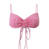 Photo détourée sur fond blanc du haut de maillot de bain Remini rose vichy