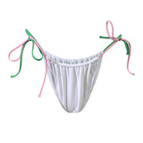 Photo détourée du bas de maillot de bain Alaior blanc avec les bretelles roses et vertes, sur fond blanc